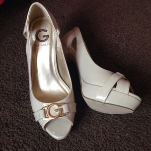 Open toe cream colored heels.