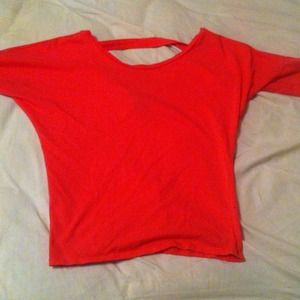 Soft pink slightly opened back, quarter sleeve.