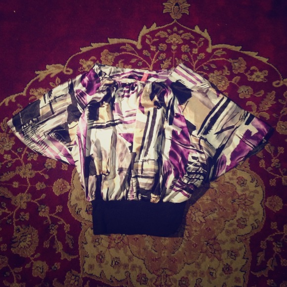 A purple, cream, gray, and black silky shirt. - Picture 1 of 3