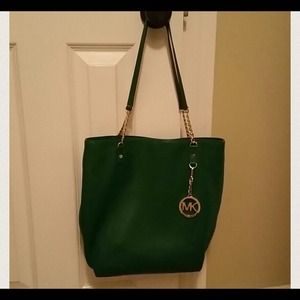 Authentic green Michael Kors purse trade value 130