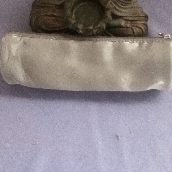 Never used make up bag for purse. - Picture 2 of 2