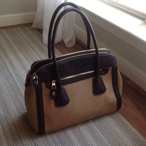 Tan and black satchel
