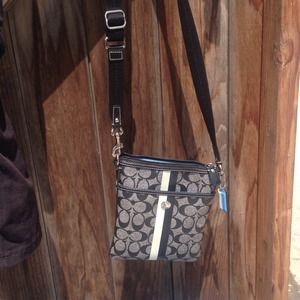 Black and gray cross body coach purse
