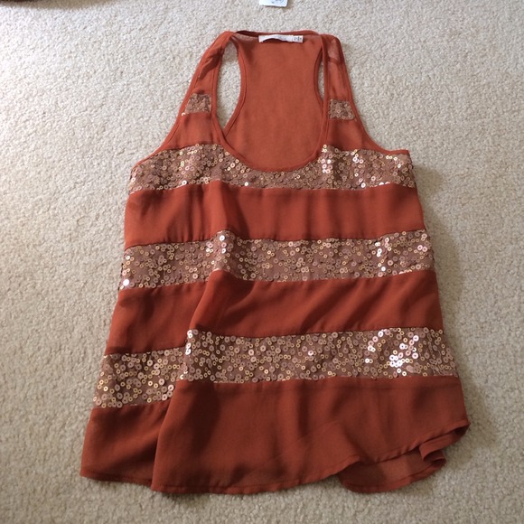 Gold and orange tank