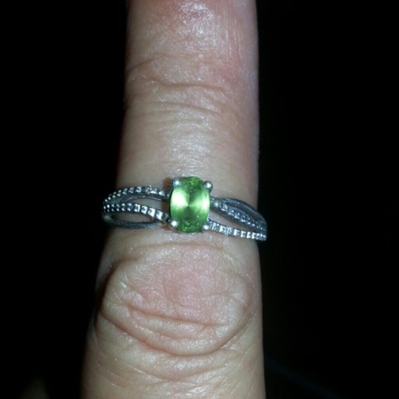 Sterling silver ring with green stone.