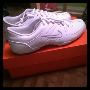 White Nike cheer shoes.
