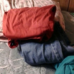 Two pairs of pants red are 22w and then jeans 18
