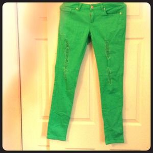 Green jeans with shredded front