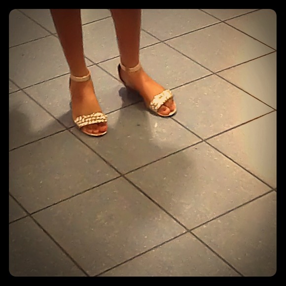 Gold colored shoe