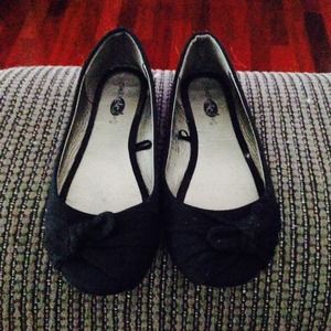 Gently used black flats