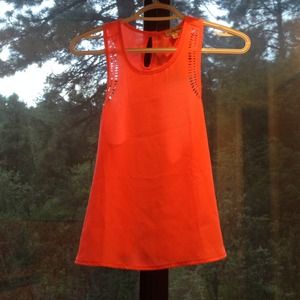 Never worn neon coral laser cut top