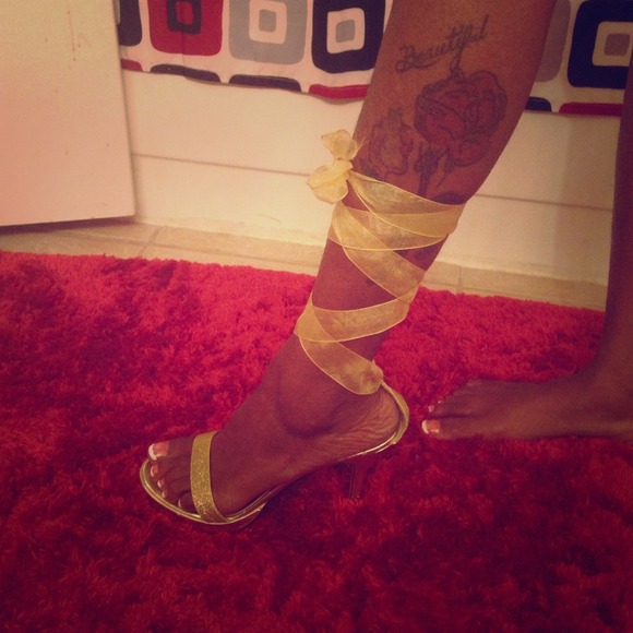 Gold heels.
