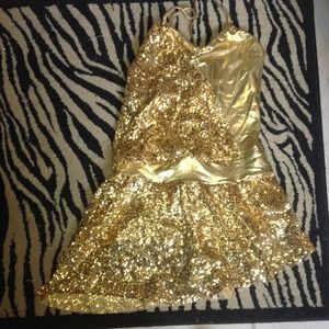 Gol with gold sequin dance costume