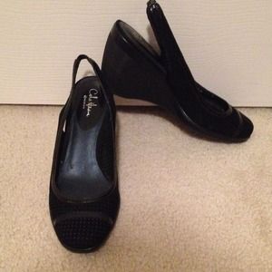 Cole Haan black suede wedge shoes.