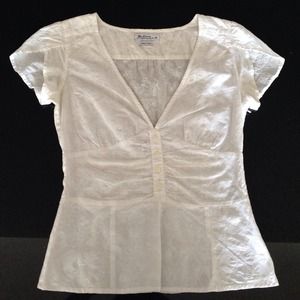 White v neck blouse with floral detail