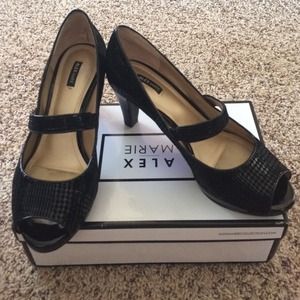 Black high heel peep toe shoe by Alex Marie