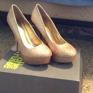 Gold glitter high heels