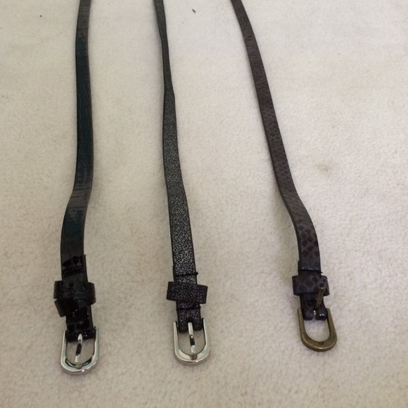 three fashionable, unique skinny black belts