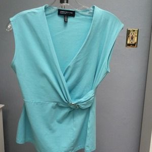 Aqua blue sleeveless shirt.