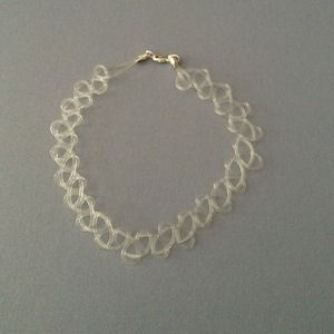 Clear tattoo choker