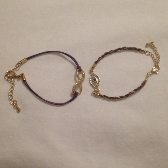 Two purple and gold bracelets