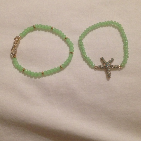 Two mint green and gold bracelets