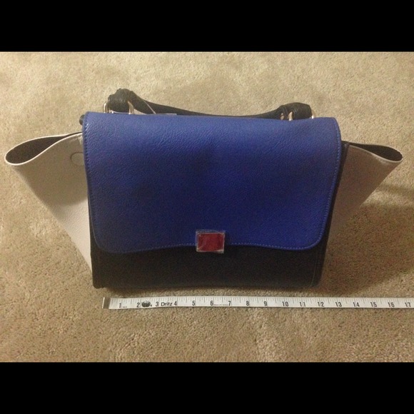 Designer inspired blue color block trapeze bag