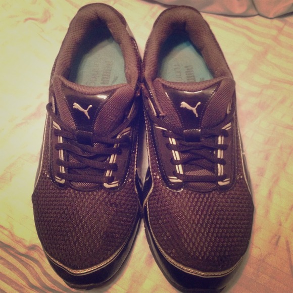 Black and grey puma running shoes