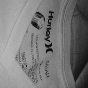 Hurley small white tee never been worn