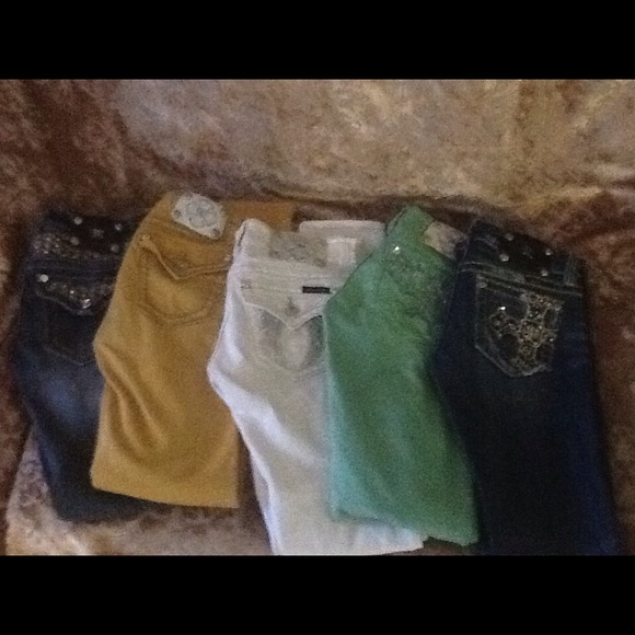 Five pair of "Miss Me" jeans