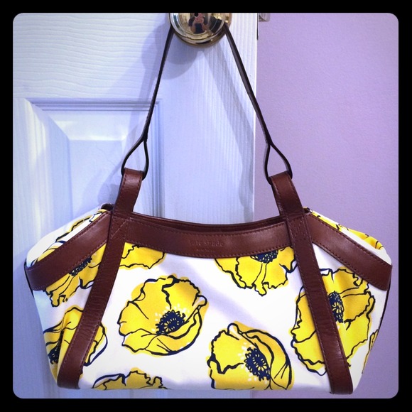 Kate Spade purse with brown leather trim