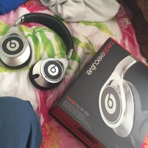 Beats executive with box and galaxy