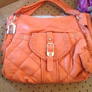 Peach colored Glam Bag from Closet Glam Boutique