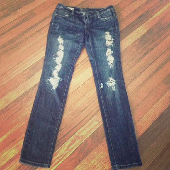Destroyed/ ripped dark wash jeans
