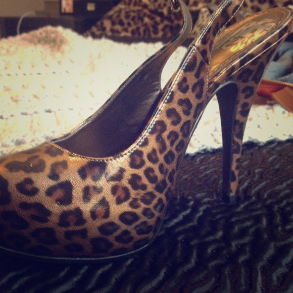 Free press leopard strap heels.