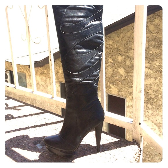 Brand new black leather boots