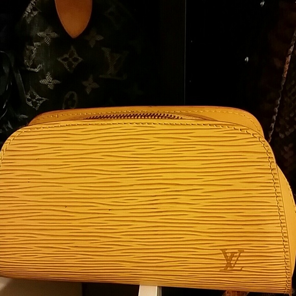 Louis Vuitton Handbags - Louis vuitton coin or cosmetic bag SOLD