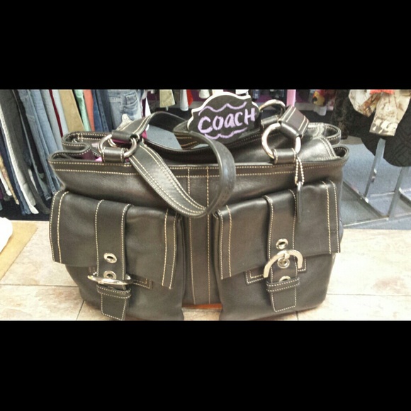 Coach handbag.  Black Leather . Will hold Laptop