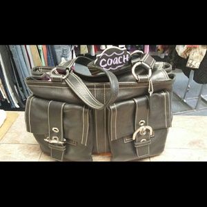 Coach handbag.  Black Leather . Will hold Laptop
