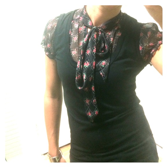 Fused sheer floral blouse black vest.