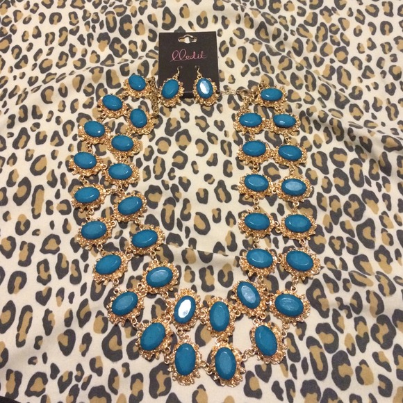 Teal color statement necklace with earrings