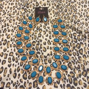 Teal color statement necklace with earrings