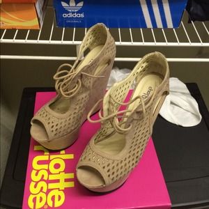 A pair of taupe color wedges!