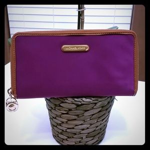 Purple nylon Michael Kors zip around wallet