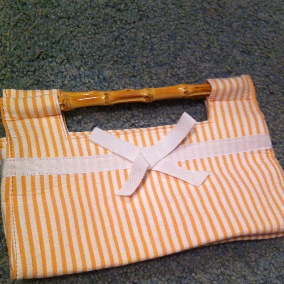 Orange seersucker clutch