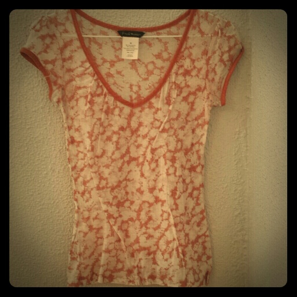 Sheer burnt orange top.