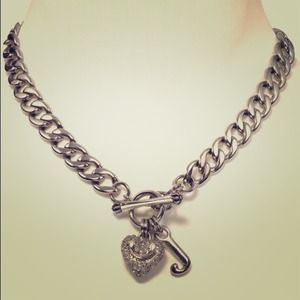 Silver juicy couture heart necklace.