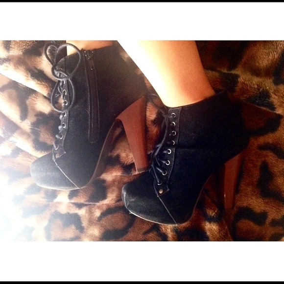 Lace up booties.