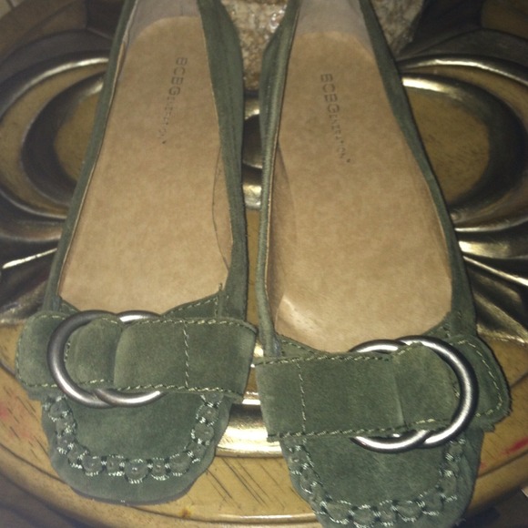 Green suede BCBG Generation loafers.