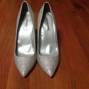 H by halston. Silver glitter pumps.